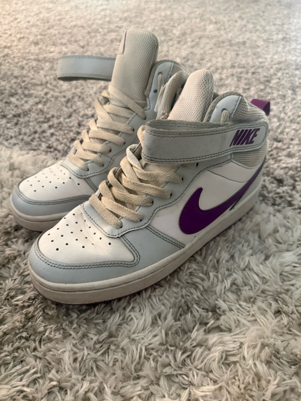 Nike Women’s Mid-Top Sneakers in White and Purple Accents